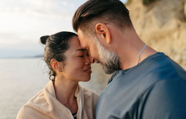 Man with a woman on the beach